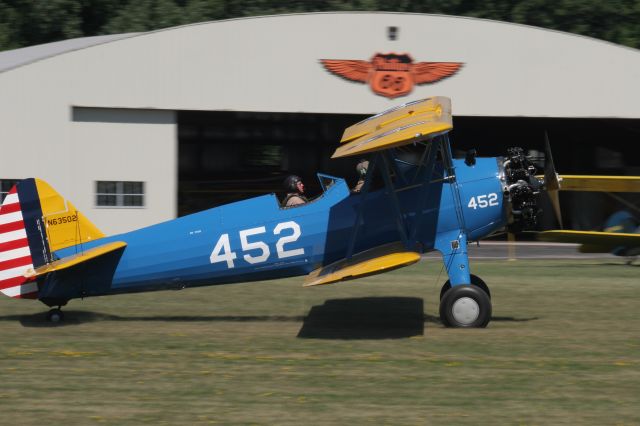— — - Boeing Stearman Rolling to a Stop at the EAA Grounds