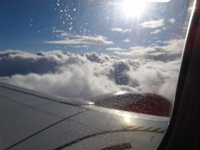 Boeing 737-800 (D-ABKS) - sun above the clouds -