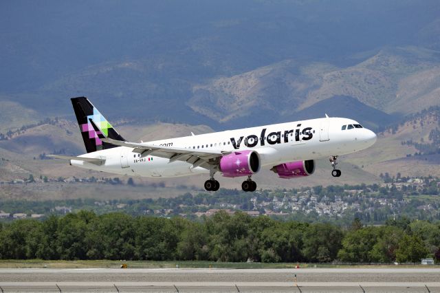 Airbus A320 (XA-VRJ) - Volaris A320 over the numbers for RWY 35R at Reno-Tahoe International Airport.