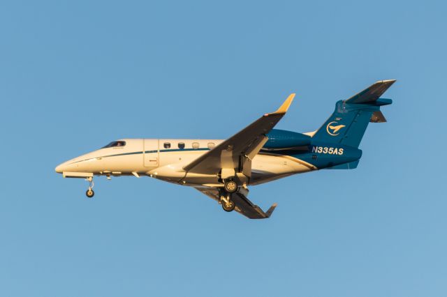 Embraer Phenom 300 (N335AS) - Arriving 31L