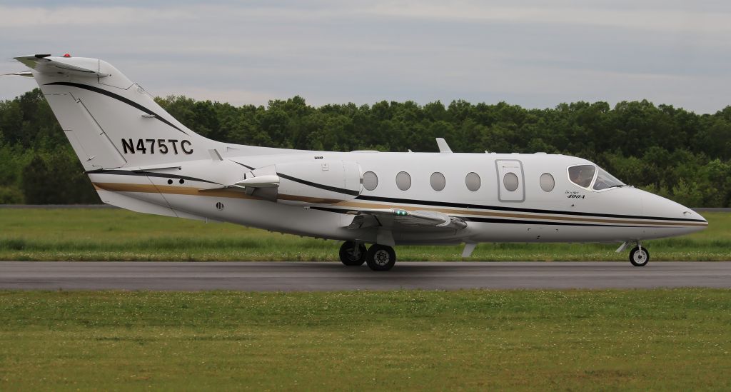Beechcraft Beechjet (N475TC) - A 1997 model Beechjet 400A taxiing for departure at Boswell Field, Talladega Municipal Airport, AL after NASCAR'S 2023 GEICO 500 Race @ Talladega Superspeedway - late afternoon, April 23, 2023.