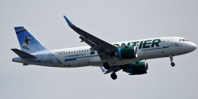 Airbus A320 (N351FR) - Frontier's new plane with "Joey the opossum" is seconds from landing, spring 2019.