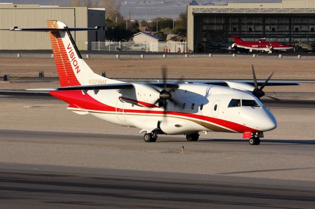 Fairchild Dornier 328 (N329MX) - Vision Airlines N329MX taxiing to parking after landing. [Date: Jan 1, 2009]