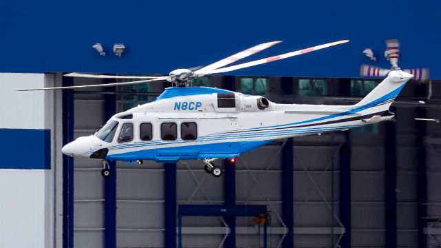 BELL-AGUSTA AB-139 (N8CP) - A Pfizer AW139 departing past their hangar enroute to JRA after taking pax from N4CP.