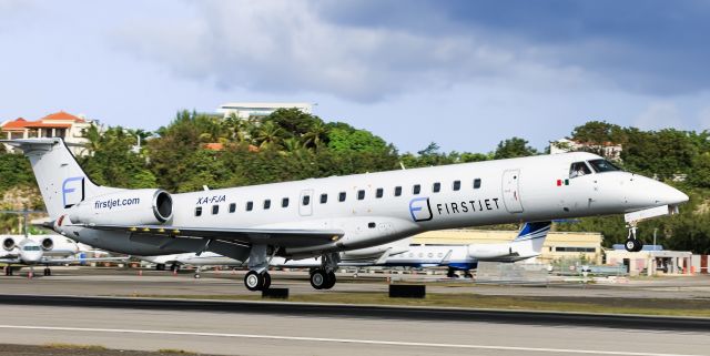 XA-FJA — - The Mexicans landing with their Embraer ERJ-145MP firstjet XA-FJA at TNCM St Maarten.