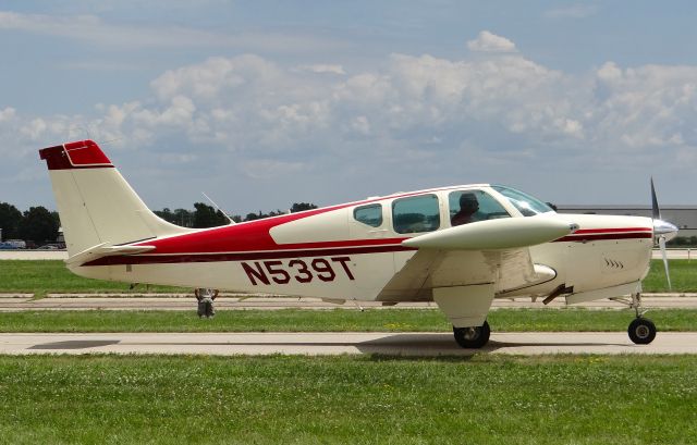 Beechcraft Bonanza (33) (N539T) - A Beechcraft Baby Clipper taxing for departure at Oshkosh AirVenture 2015!