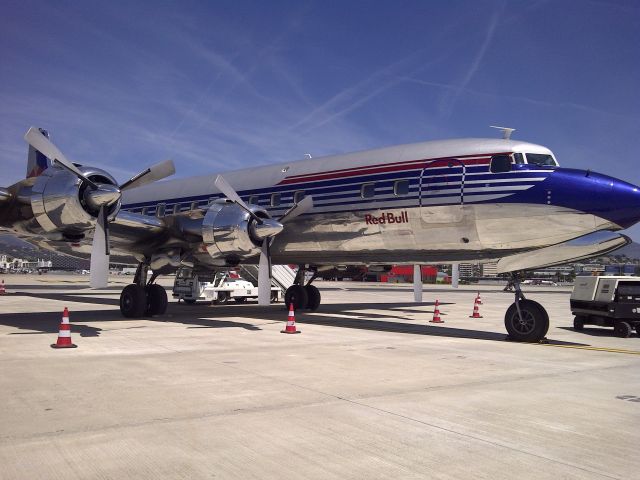 Douglas DC-6 (N996DM) - Red Bull DC-6 on the ramp LFMN (NICE).  During the Grand Prix.