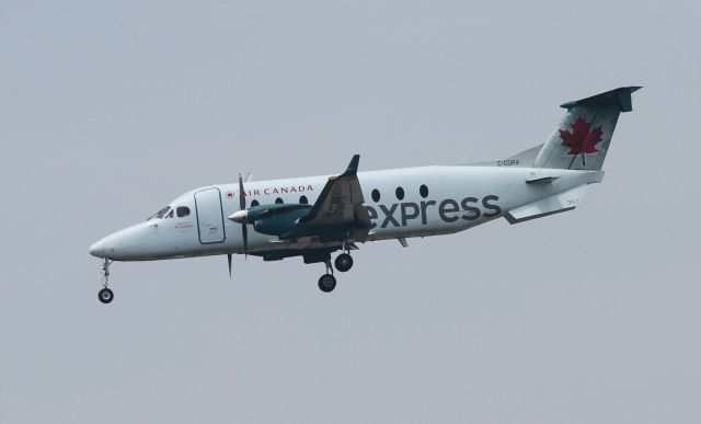 Beechcraft 1900 (C-GORA) - Air Canada Express Beechcraft 1900 on approach to 24R at YYZ, Toronto.