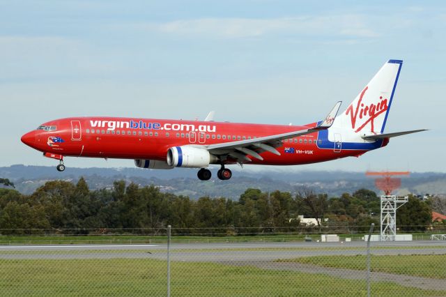 Boeing 737-800 (VH-VUK) - About to put down on runway 05. Thursday, 19 June 2014.