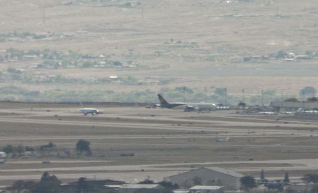 — — - American Airlines' Piedmont Heritage livery, a couple of USAF C130Js, and a UPS 767-300ERF