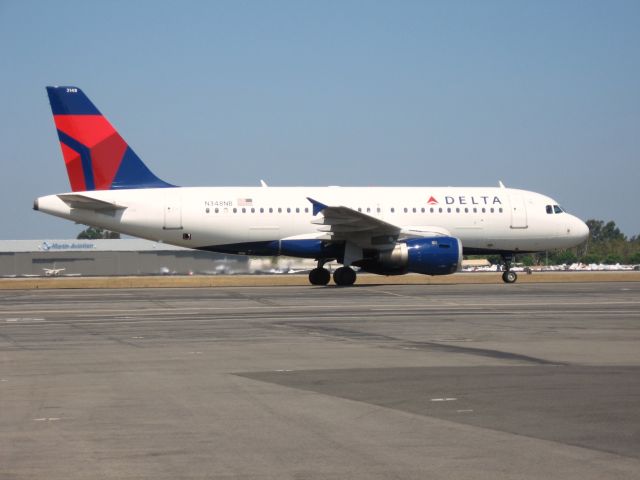 Airbus A319 (N348NB) - Taxiing to gate after landing