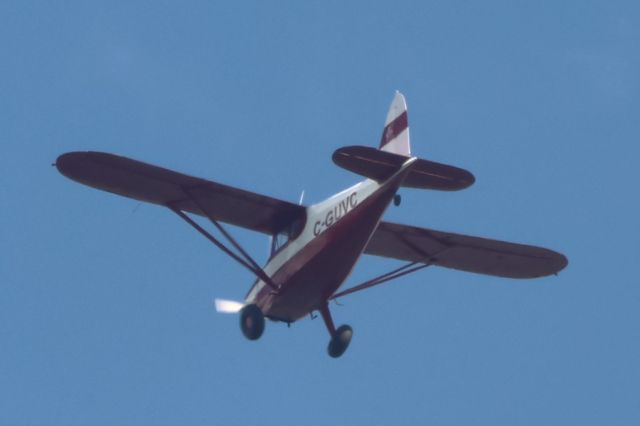 C-GUVC — - C-GUVC Stinson 10-A Survolant le fleuve St-Laurent QC. à Lavaltrie Le 21-07-2024 à 14:57.