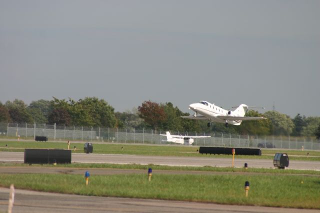 Beechcraft Beechjet (N477LX) - Taking Off from Republic - Farmingdale (10/4/08)