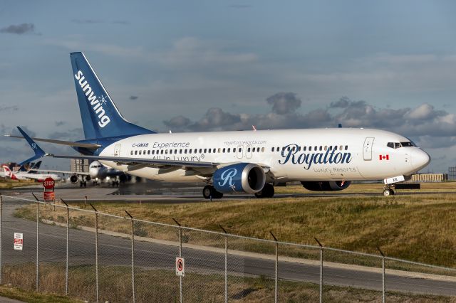 Boeing 737 MAX 8 (C-GMXB) - 18th July, 2022: Sunwing's B783-Max wearing 'Royalton Luxury Resorts' livery is seen taxiing to runway 06R for departure to Punta Caña in the Dominican Republic as flight WG 438.