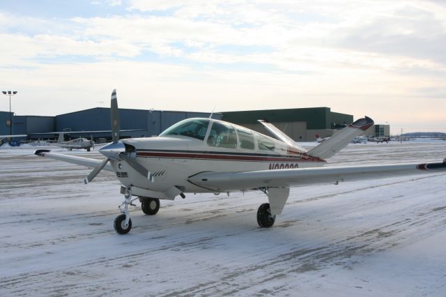 Beechcraft 35 Bonanza — - Fueled up and heading out.