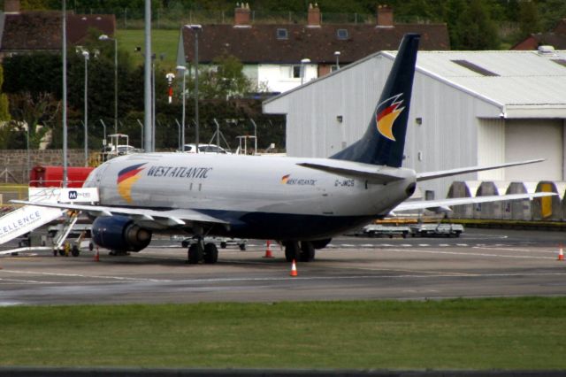 BOEING 737-400 (G-JMCS) - Parked on Stand 206 on 6-May-19.