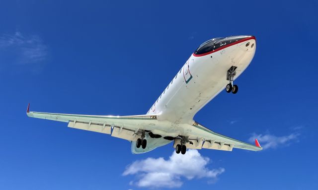 Canadair Regional Jet CRJ-200 (HI1034) - HI1034 arriving @ SXM. 3/21/22. 