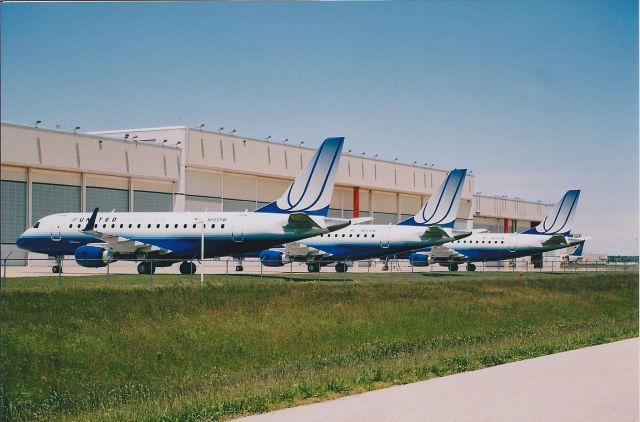 Embraer 170/175 (N650RW) - 3 OF A KIND at KIND. N650RW foreground, N651RW in the middle. Can't make out the one in back.