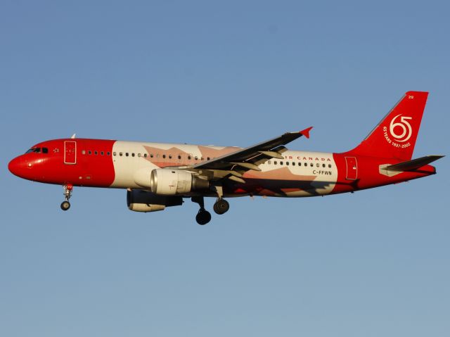 Airbus A320 (C-FFWN) - The Symphony of Voices about to land on Rwy 28 in Calgary