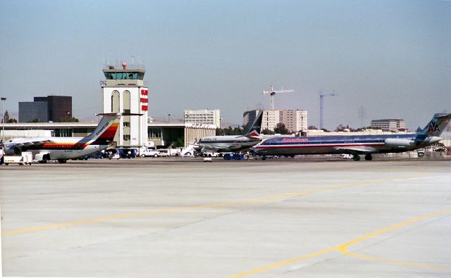 British Aerospace BAe-146-200 (N141AC) - KSJC - late 1980s view from the long term parking lot as San Joses then new terminal A was being built offered great aircraft viewing from this location in the parking lot.
