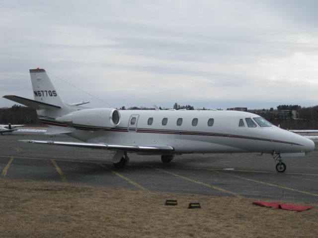 Cessna Citation Excel/XLS (EJA677P) - Parked on the ramp in Fitchburg, MA.