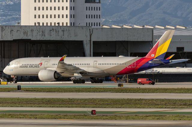 Airbus A350-900 (HL7771) - 25th of January, 2024: Aircraft being towed to the apron for the 7 hour layover at LAX between flights from (OZ 204) and to (OZ 203) Incheon in Seoul. 