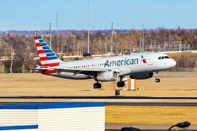 Airbus A320 (N667AW) - American Airlines A320 landing at OKC on 1/1/23. Taken with a Canon R7 and Tamron 70-200 G2 lens.