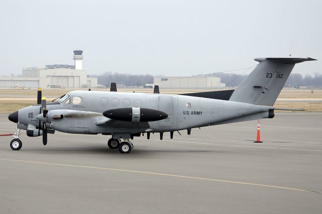 Beechcraft Super King Air 200 (7823142) - RC-12D being towed to a hangar for an overnight stay. February 2013