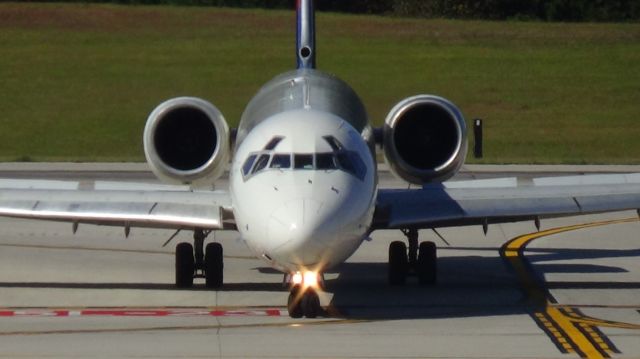 McDonnell Douglas MD-90 (N964DN) - Delta 1564 turning off runway 5L is using a "Mad Dog" 90 today.  Taken October 27, 2014.