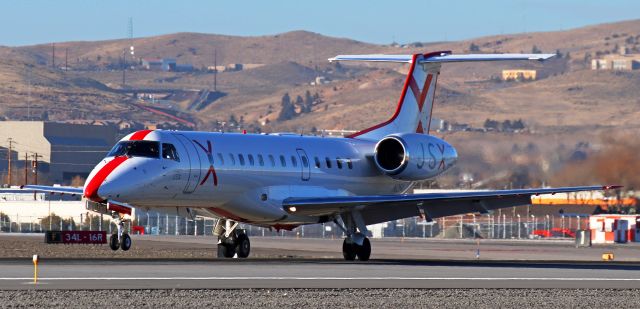 Embraer ERJ-135 (N254JX) - The pilots of JSX's N254JX are just about to put the nose gear in contact with the concrete as they land on Runway 16L.