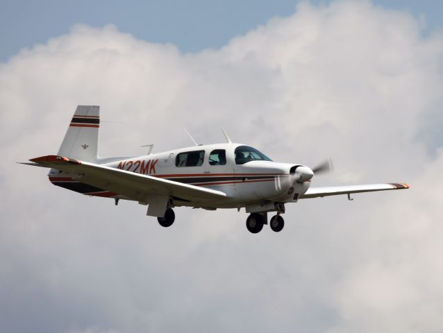 Mooney M-20 (N22MK) - Landing on RW26 at KDXR. RELIANT AIR has the lowest fuel price on the Danbury (KDXR)airport.