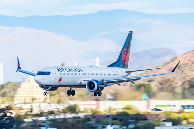 Boeing 737 MAX 8 (C-FSOC) - An Air Canada 737 MAX 8 landing at PHX on 2/28/23. Taken with a Canon R7 and Canon EF 100-400 L ii lens.