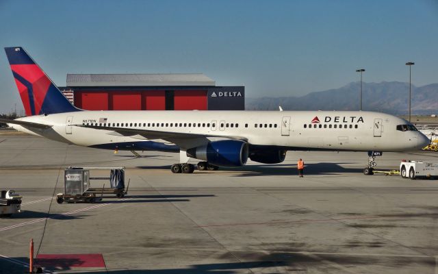Boeing 757-200 (N671DN) - DL 757-232 N671DN being pushed back out at SLC after my flight from SEA on Sept 29, 2010. This 1991-built 757 is still plowing the skies as a pax carrier in 2023.