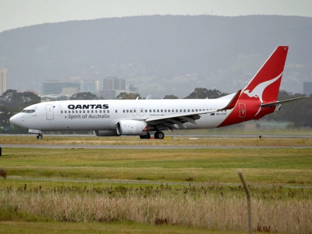 Boeing 737-800 (VH-VYF) - On taxi-way heading for Terminal 1 after landing on runway 23. Friday 5th October 2012.