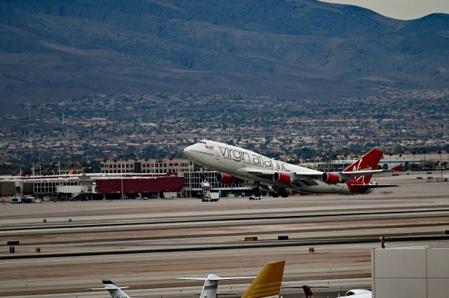 Boeing 747-200 (G-VLIP) - Standing atop MGM Grand parking structure, G-VLIP (Hot Lips) departing runway 1R McCarran Intl Airport Las Vegas Nevada