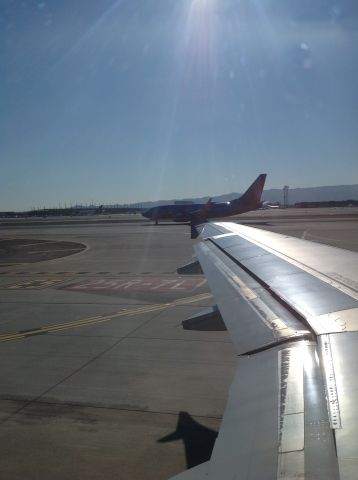 Airbus A319 (N813AW) - Holding short of the runway, number 4 for departure behind a Delta 738, Southwest 737, US Airways A321, and ExpressJet CRJ-200.