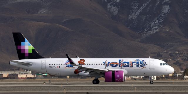 Airbus A320neo (N532VL) - This is the first photo of Volaris's N532VL wearing VOI's new (two-month-old) "Space Jam - Una Nueva Era" special livery to be posted into FA's gallery. This snap of the right side of the A320Neo was taken three and a half hours ago (1 PM , 22 Dec 21) as N532VL was reversing thrust and slowing down after landing on 16R to finish the first half of a round-trip run from Guadalajara to Reno and back. As this is being posted, N532VL is enroute back to MMGL (Guadalajara).br /* NOTE -- The decal scheme on the left side is different. I will post a closeup click of that side tomorrow. *