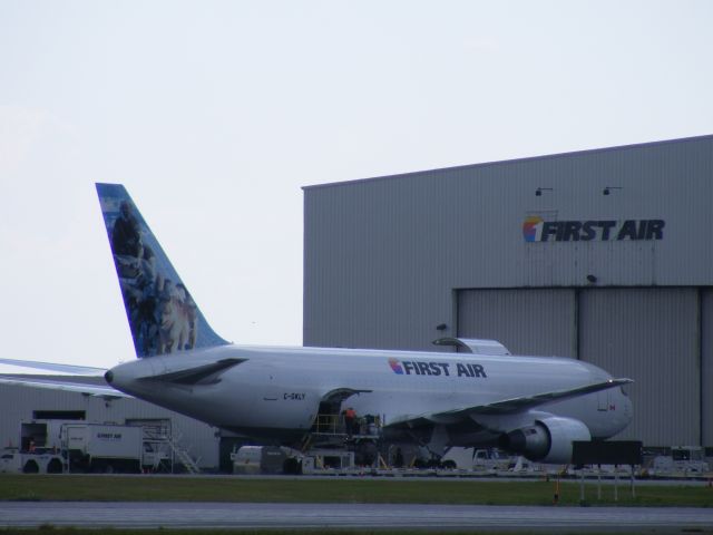 C-GKLY — - being unloaded at First Air hangar, LOOK "New" tail!!