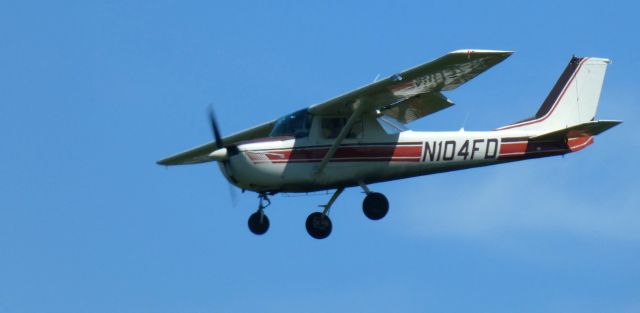 Cessna Commuter (N104FD) - About to touch down is this 1968 Cessna 150H in the Summer of 2024.