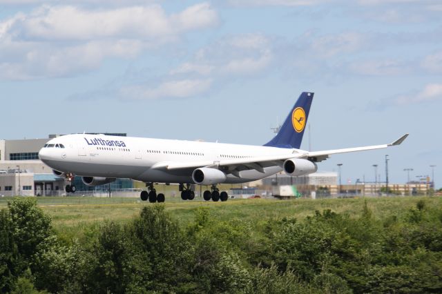 Airbus A340-300 — - Lufthansa flight#472 Arriving At Lester B.Peasrson Airport,Toronto,Canada, Photo taken july 4.2009