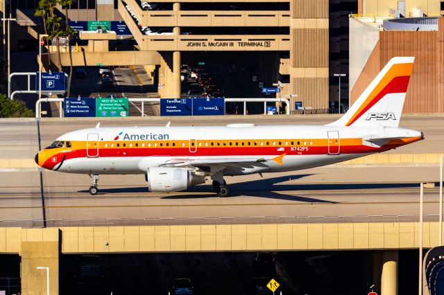 Airbus A319 (N742PS) - American Airlines A319 in PSA retro livery taxiing at PHX on 10/29/22. Taken with a Canon 850D and Tamron 70-200 G2 lens.
