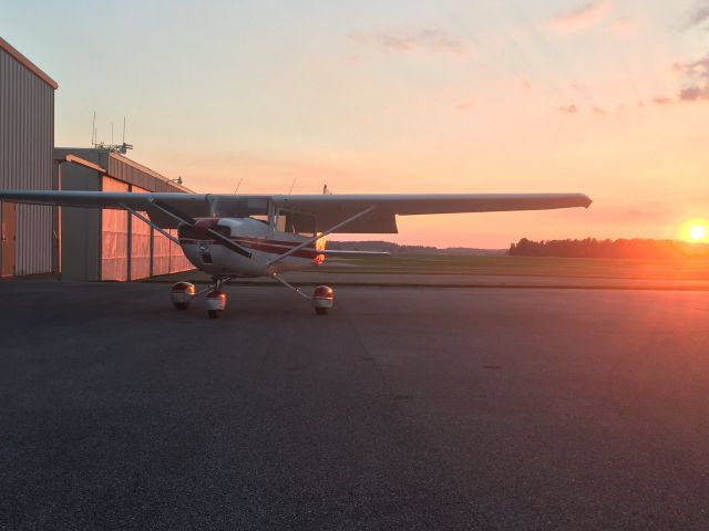 Cessna Commuter (N63420) - Parked outside Hangar 3, just completed preflight before a sunset flight and some night pattern work.  