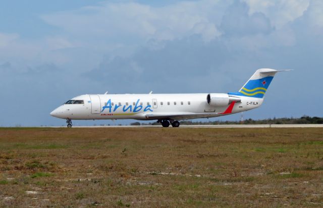 Canadair Regional Jet CRJ-200 (C-FXLH) - ARU508 TNCB-TNCC-TNCA CRJ2 C-FXLH lining up on RWY 10 at TNCB. Aruba Airlines is TNCBs newest airline.