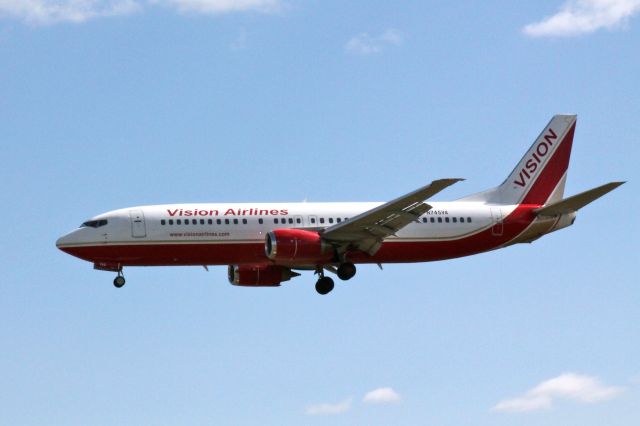 Airbus A319 (N745VA) - This is a shot of Vision Airlines N745VA, a Boeing 737-400 seen here landing at BWI Airport from The Bahamas on March 28, 2012.  Photographed from the Thomas Dixon Observation Park on Dorsey Road.