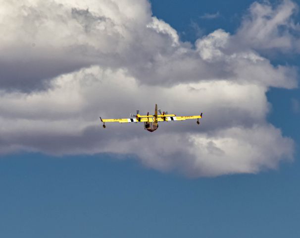 Canadair CL-415 SuperScooper (N419BT) - Off into the clouds