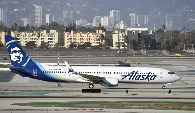 Boeing 737-900 (N266AK) - Taxiing to gate at LAX