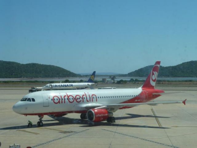 — — - Tarmac at Ibiza airport.