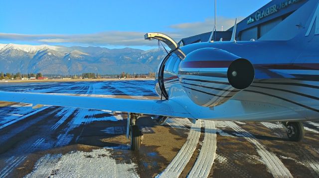 Eclipse 500 (N136TE) - N136TE Eclipse very light jet on the ramp at Glacier Park with Elite Flight Jets