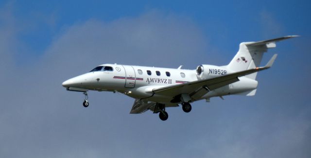 Embraer Phenom 300 (N1952R) - On short final is this 2021  Embraer Phenom 300 in the Spring of 2022.