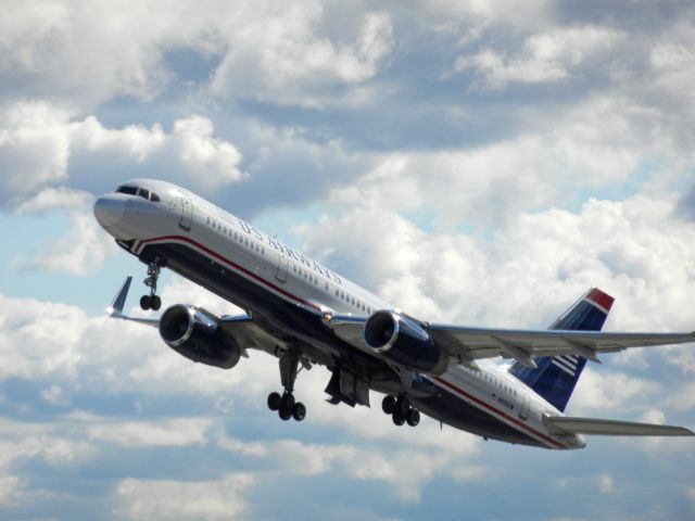 Boeing 757-200 (N935UW) - Photo from public observation area. Takeoff from 36C. Nikon S9100 f5.5 - 1/1600. Taken 01/27/12.